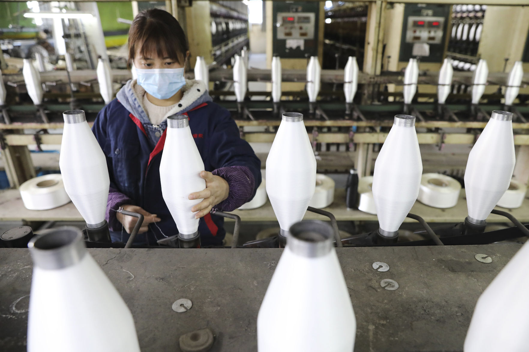 APTOPIX China Outbreak Economy